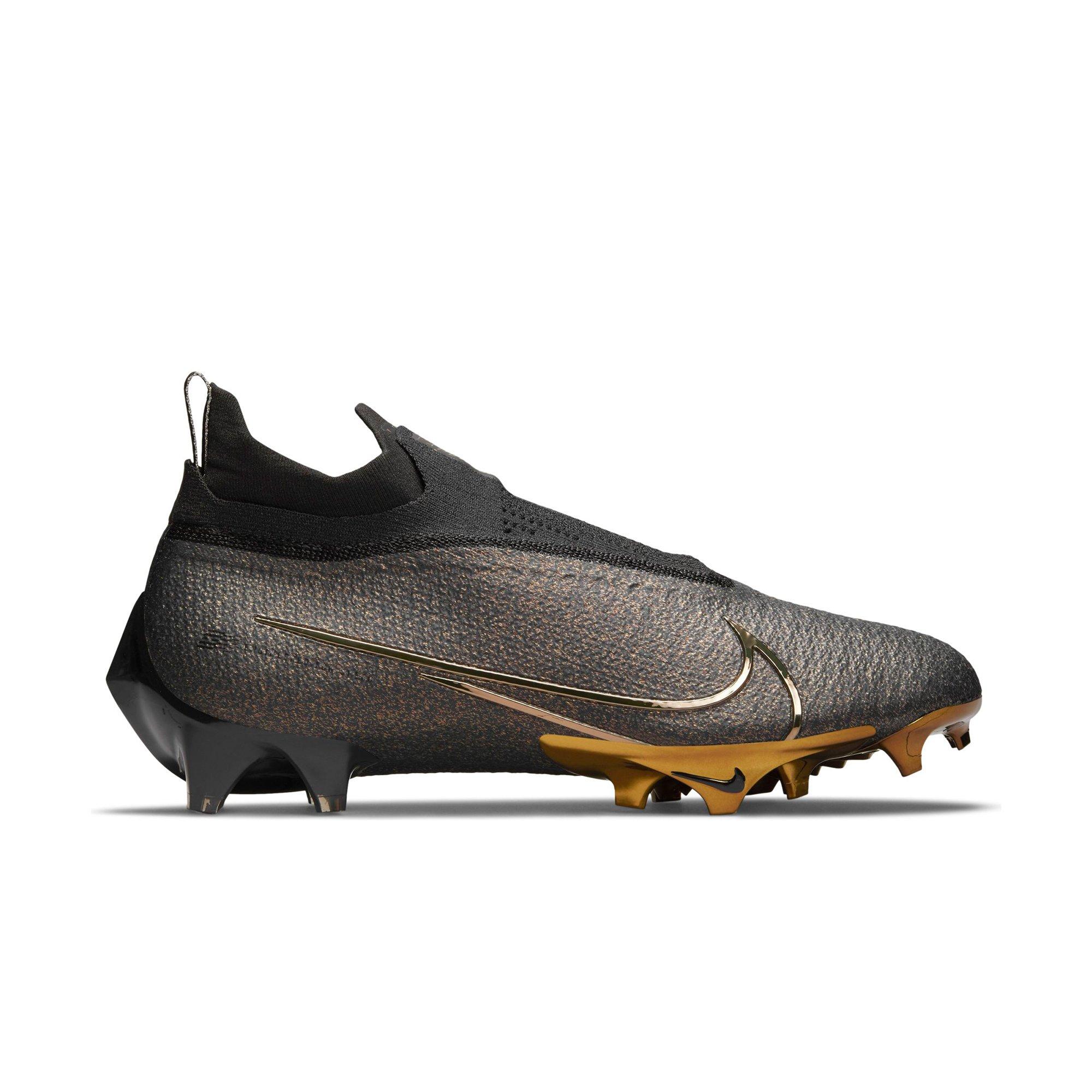 nike soccer cleats black and gold